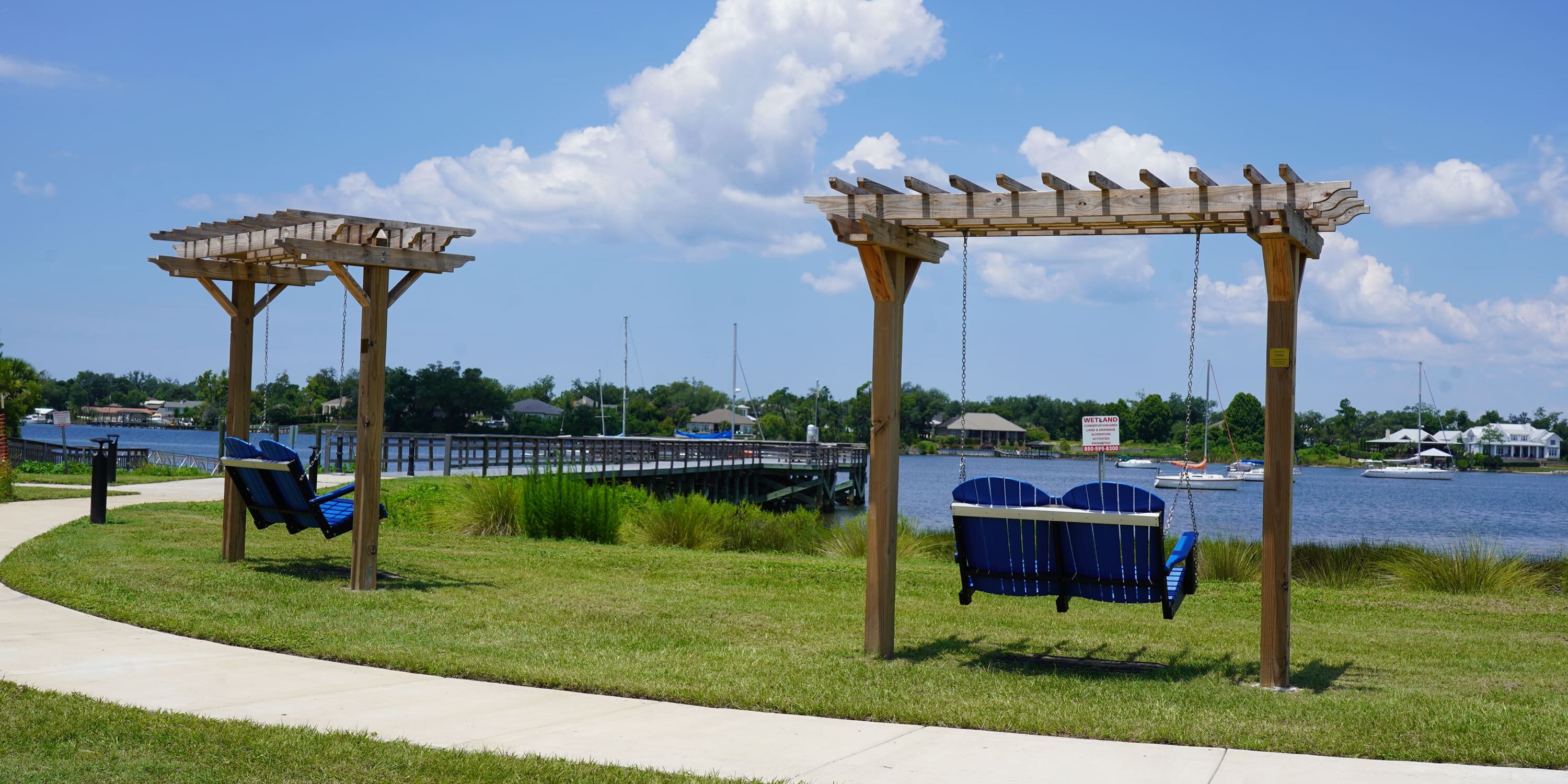 Waterfront park with swings overlooking St. Andrews Bay in Panama City, Florida